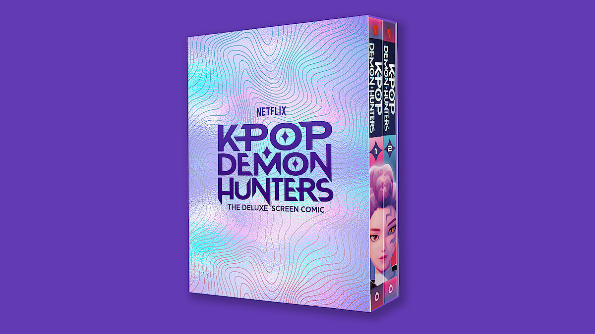 A deluxe screen comic box for Netflix's "Kpop Demon Hunters" is shown against a solid purple background, with iridescent pastel patterns and bold purple text on the cover.
