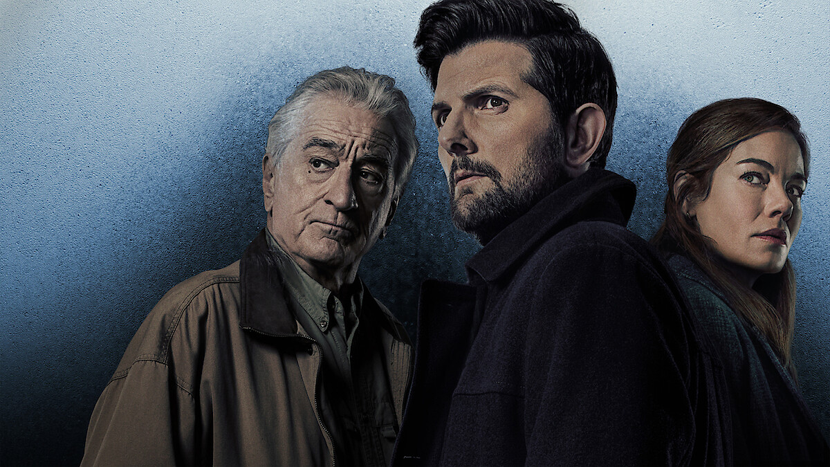 Three serious-looking adults, two men and one woman, stand closely together against a cool-toned textured background, creating a dramatic and mysterious atmosphere.