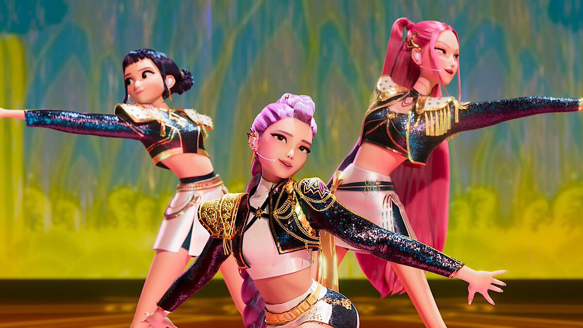 Animated still of three women performing onstage in 'KPOP Demon Hunters'
