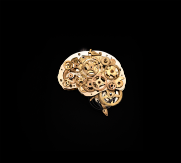 gold gears that create a brain on black background