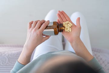 taking handful pills at home