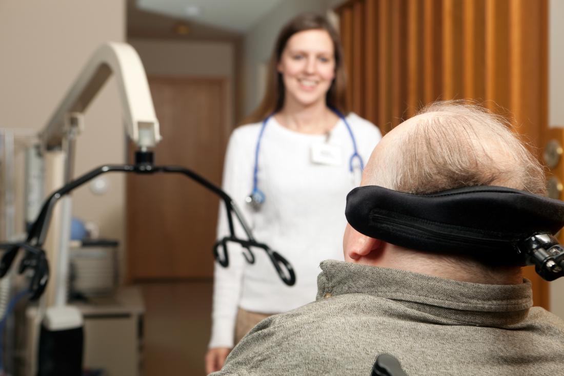 man in wheelchair and doctor