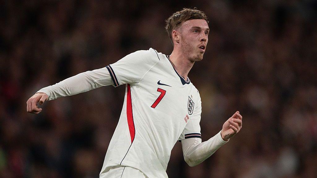 Cole Palmer wearing an England shirt