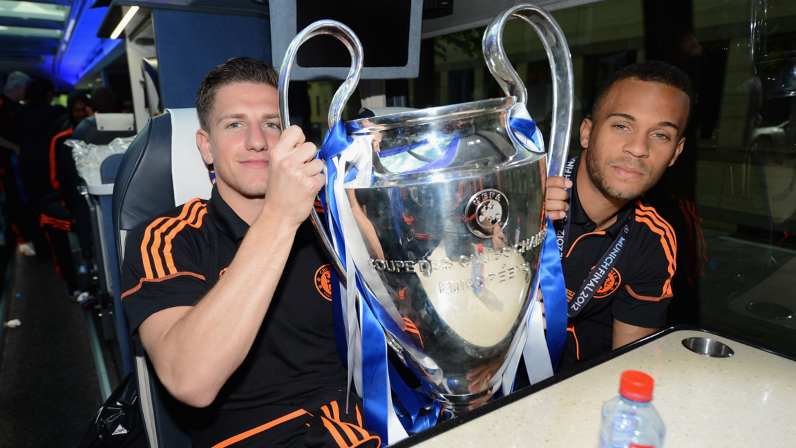 Chelsea's Sam Hutchinson (left) holds the Champions League trophy in 2012 with team-mate Ryan Bertrand