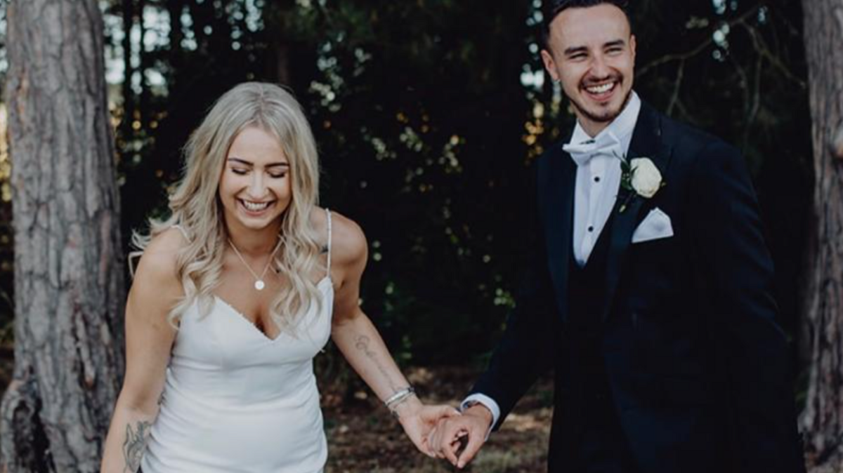 Former Barton Town goalkeeper James Hitchcock on his wedding day with wife April