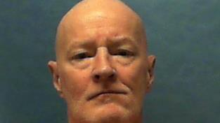 A mug shot of Loran Cole, who was convicted of murder and rape in Florida