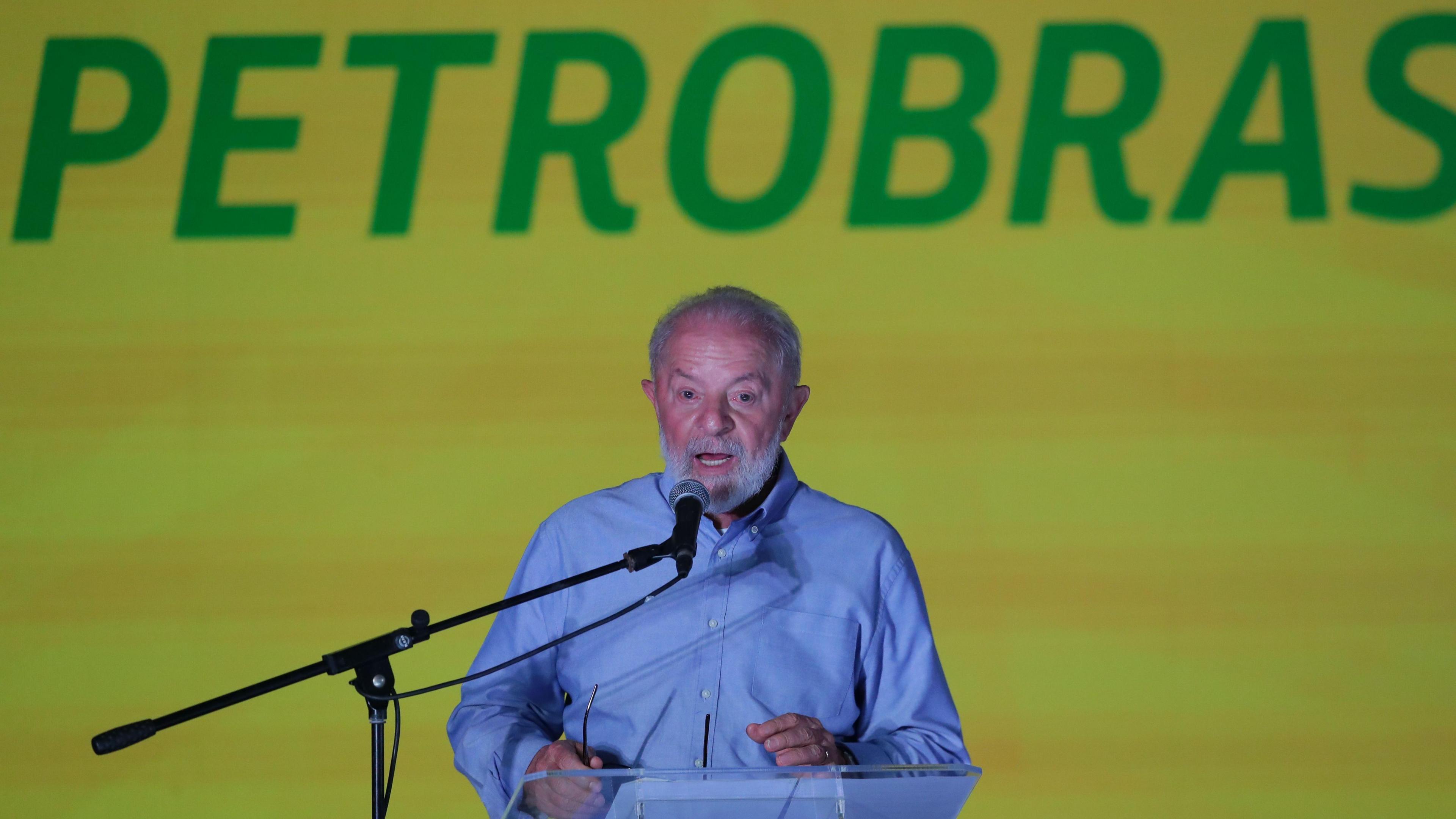 President of Brazil, Luiz Inacio Lula da Silva, speaks in front of a green and yellow Petrobras sign