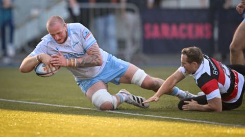 Ben Bamber falls over the line to score Sale's third try