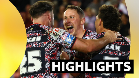 Leigh Leopards' Adam Cook celebrates with team mates after scoring a try against Bradford Bulls