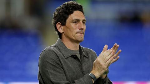 Keith Andrews with his hands together