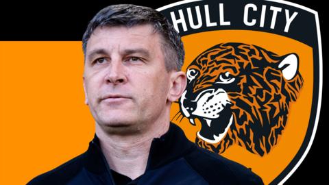 Sergej Jakirovic in front of an orange and black background and the Hull City club badge