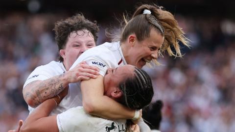 Zoe Harrison celebrates