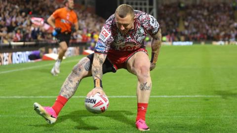 Josh Charnley grounds the ball