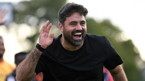 Vitor Matos smiles after Swansea City's win at Lincoln 