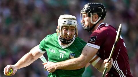 Limerick's Cian Lynch is challenged by Galway's Padraic Mannion during the 2023 All-Ireland hurling semi-final
