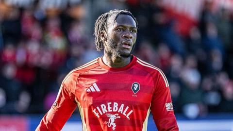 Rosaire Longelo in action for Salford City