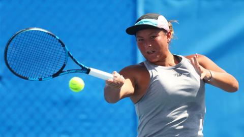 Tara Moore hits a shot
