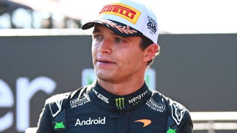 Lando Norris walking off the podium following the Spanish Grand Prix