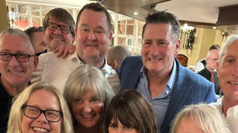 Tony Hadley with superfan Mike and friends