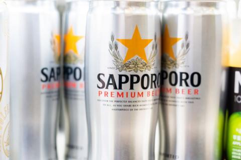 Cans of Sapporo Beer, close-up.

