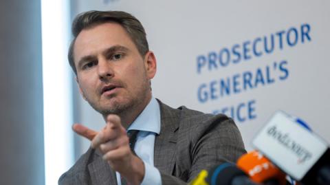 Prosecutor General of Ukraine Ruslan Kravchenko attends a press conference.