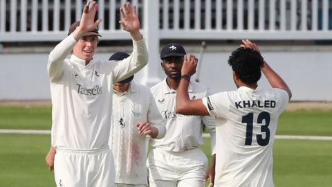 Kent players celebrate a wicket