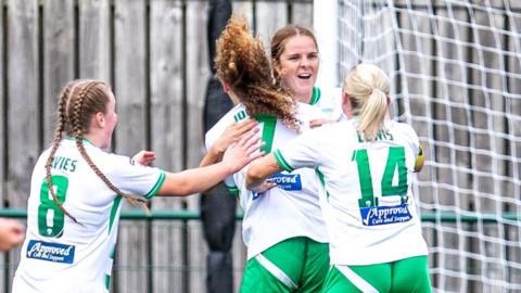 TNS celebrate their late win against Wrexham