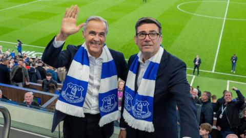 Prime Minister Andy Burnham and Prime Minister of Canada Mark Carney attend the Everton v Wolverhampton Wanderers match