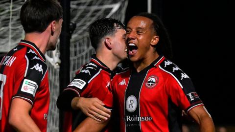 Ben Starkie celebrates scoring for Truro City