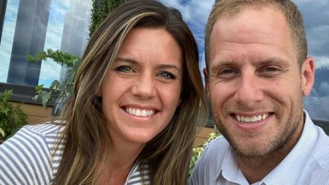 Ashley Flynn, seen in a 2023 Facebook photo, alongside her husband. They both are smiling