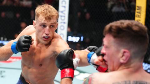 Adam Darby punches Patrick Rivera