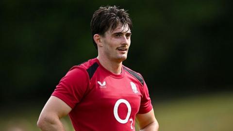 Raffi Quirke looks on during an England training session 
