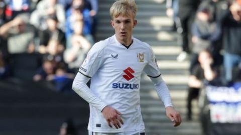Charlie Waller in white MK Dons shirt