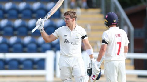 Glamorgan's Asa Tribe lifts his bat