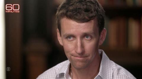 Patrick Clancy is seen doing an interview with 60 Minutes.