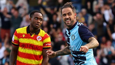 Danny Ings (right) celebrates scoring Wycombe's equaliser against Reading