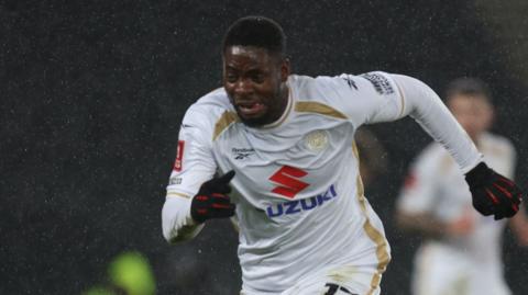 MK Dons winger Jonathan Leko in action