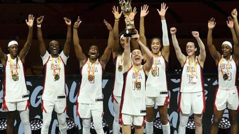 Breanna Stewart holds up World Cup