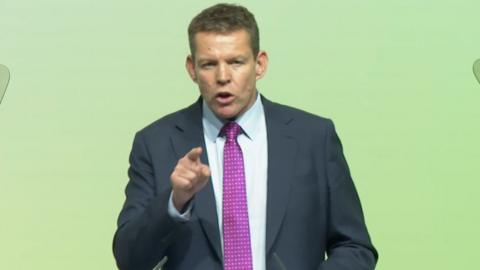 Rhun ap Iorwerth in a purple tie