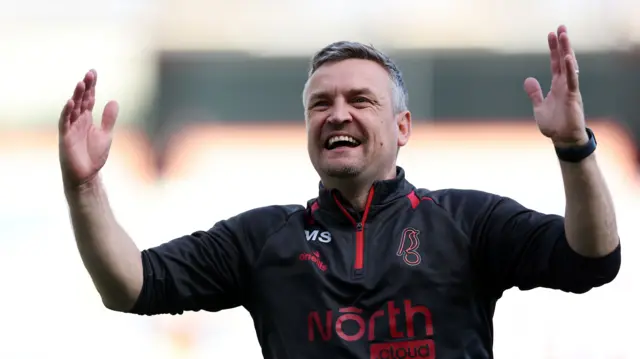 Michael Skubala celebrates after his Bristol City side defeat Burnley on Saturday