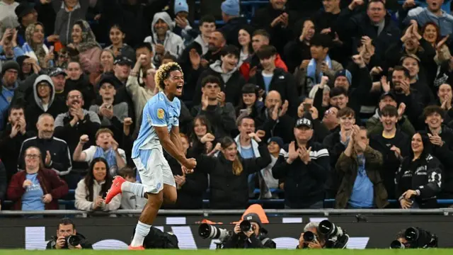 Floyd Samba celebrates