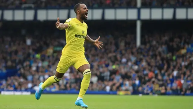 Rico Henry of Brentford celebrates 