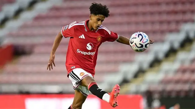 JJ Gabriel in action for  Manchester United in a Premier League 2 game