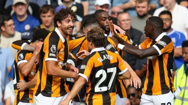 Hull City players celebrate after a goal scored by Mohamed Bellouli against Chelsea