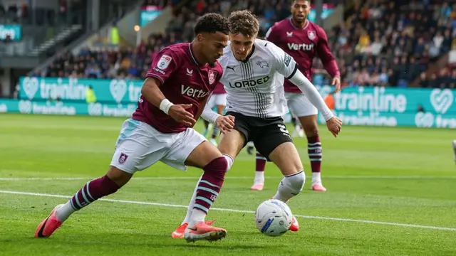 Derby's Bobby Clark closes down Marcus Edwards of Burnley