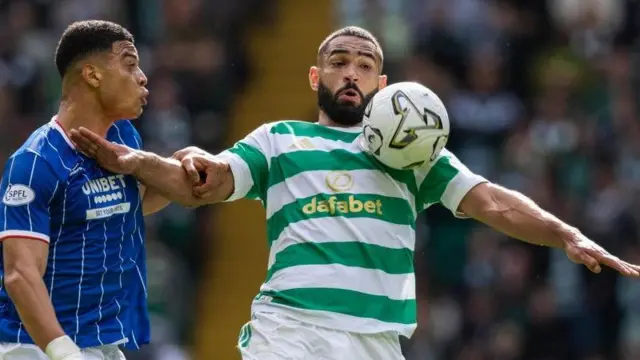Rangers' Kevin Kelsy and Celtic's Cameron Carter-Vickers