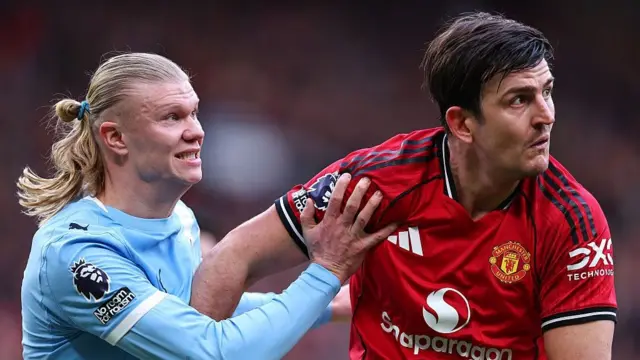 Erling Haaland and Harry Maguire tussle for the ball 