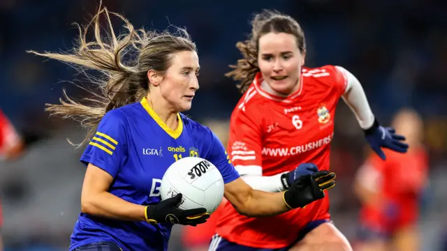 Maria O'Neill in action for Moneyglass during last year's All-Ireland club final with Kilkerrin-Clonberne's Nicola Ward closing in