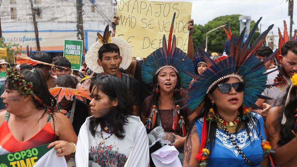 Protesters at a march in Belem, Brazil, near the COP30 climate summit. 