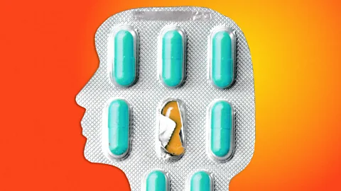 Pill packet with the metal cut to the shape of a person's profile.The packed contains blue pills, one of them removed. The profile is against a yellow-red background (Credit: BBC/ Serenity Strull)